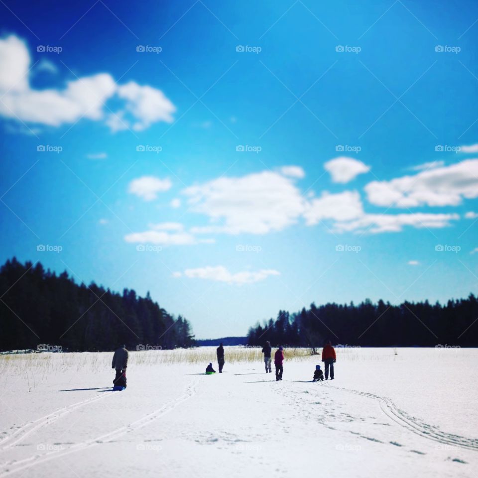 Family walk on ice