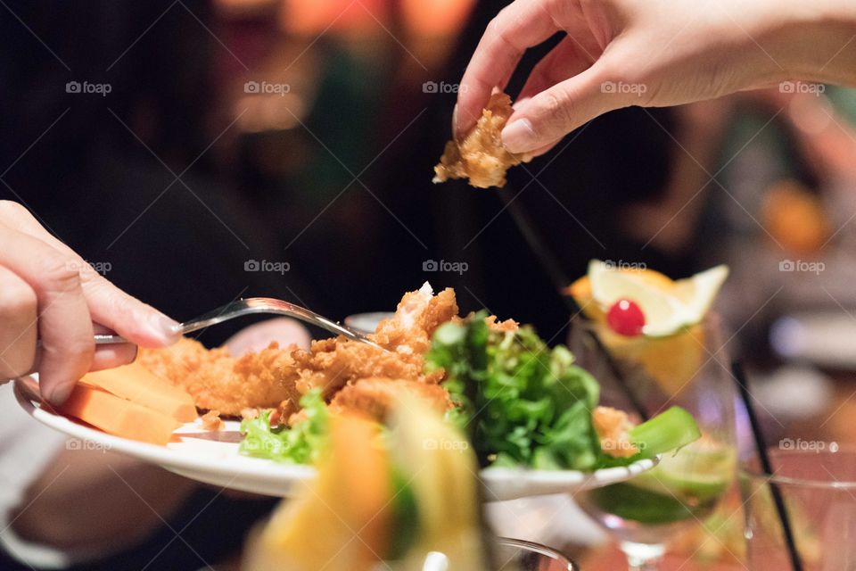 Friends enjoy apps at Happy hour 