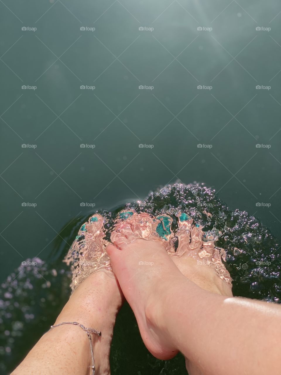 Enjoying the sun and water with my lovely mini me