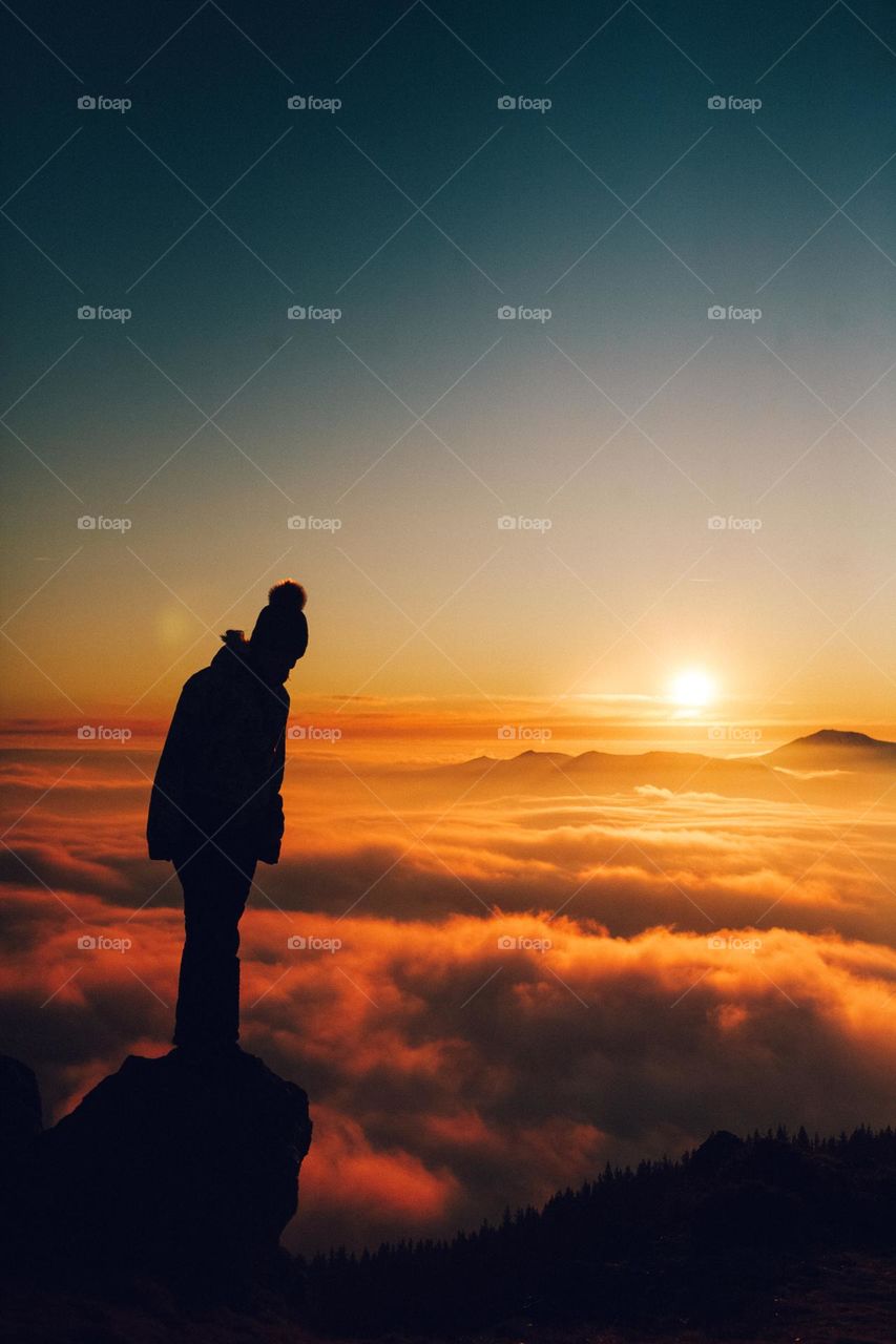 amazing colors at the sunset, over the clouds in the mountains