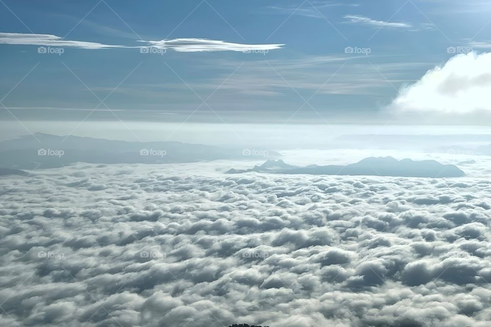 clouds fog on top of mountain morning sunshine