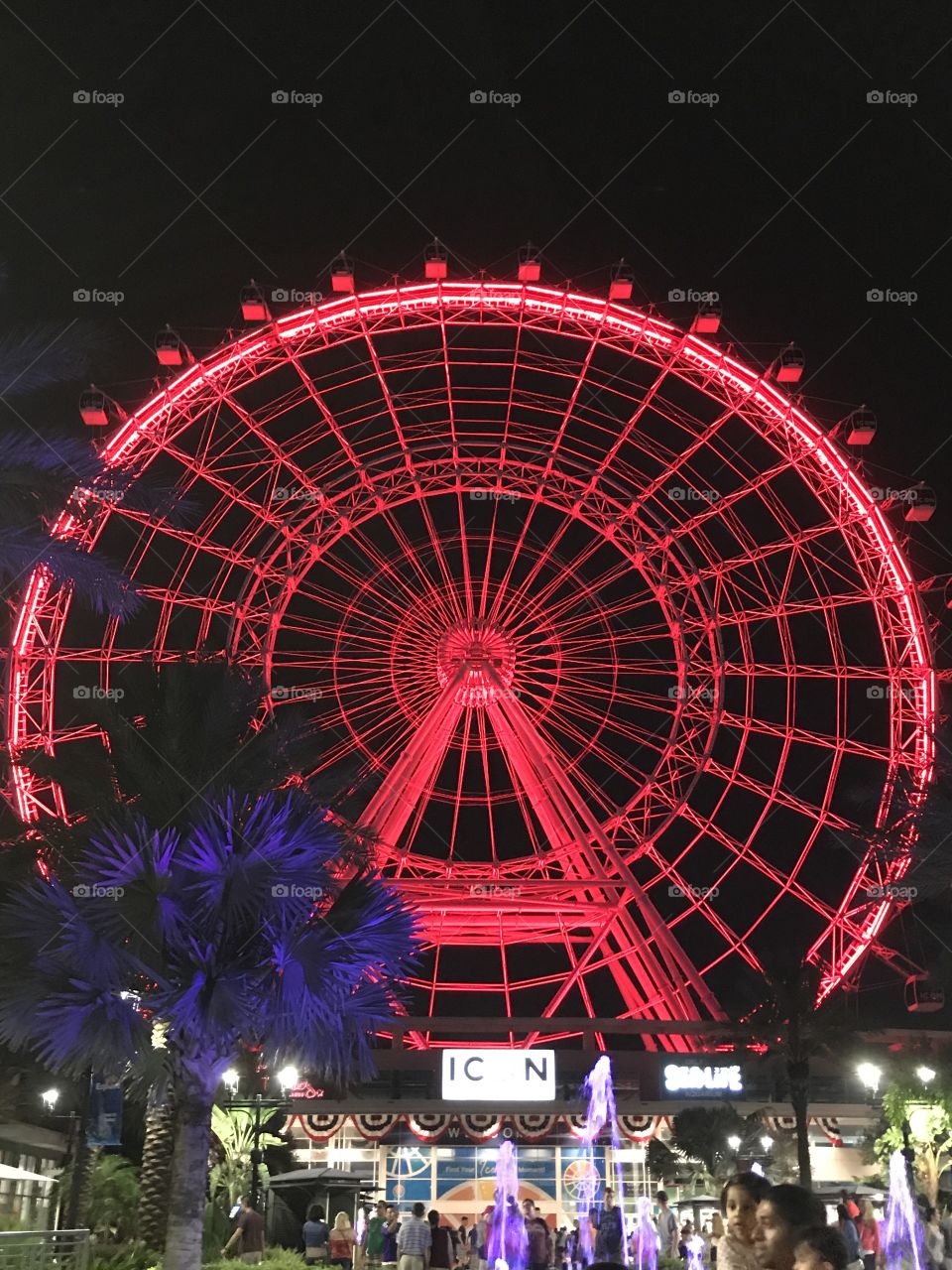 The 6th tallest Ferris wheel in the world, lighted in red.