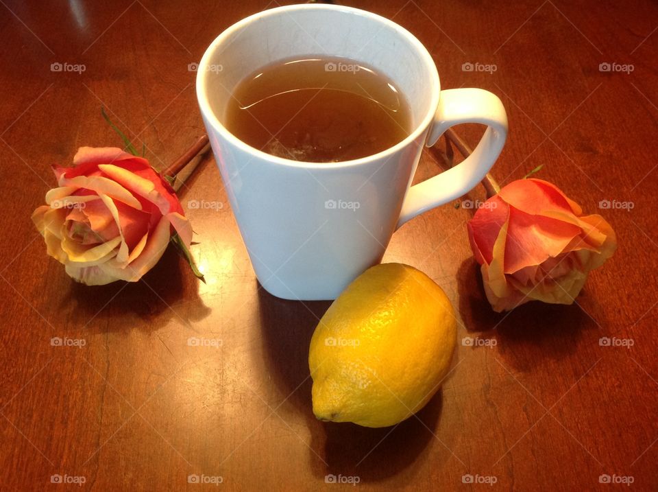 Enjoying a hot cup of tea on a rainy morning. 