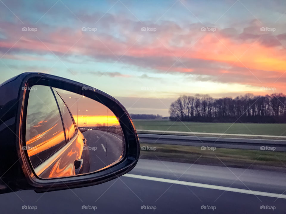 Sunset in a car mirror 