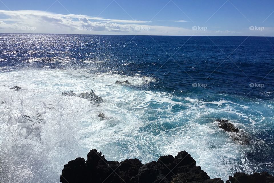 Waves and blue skies on the Big Island