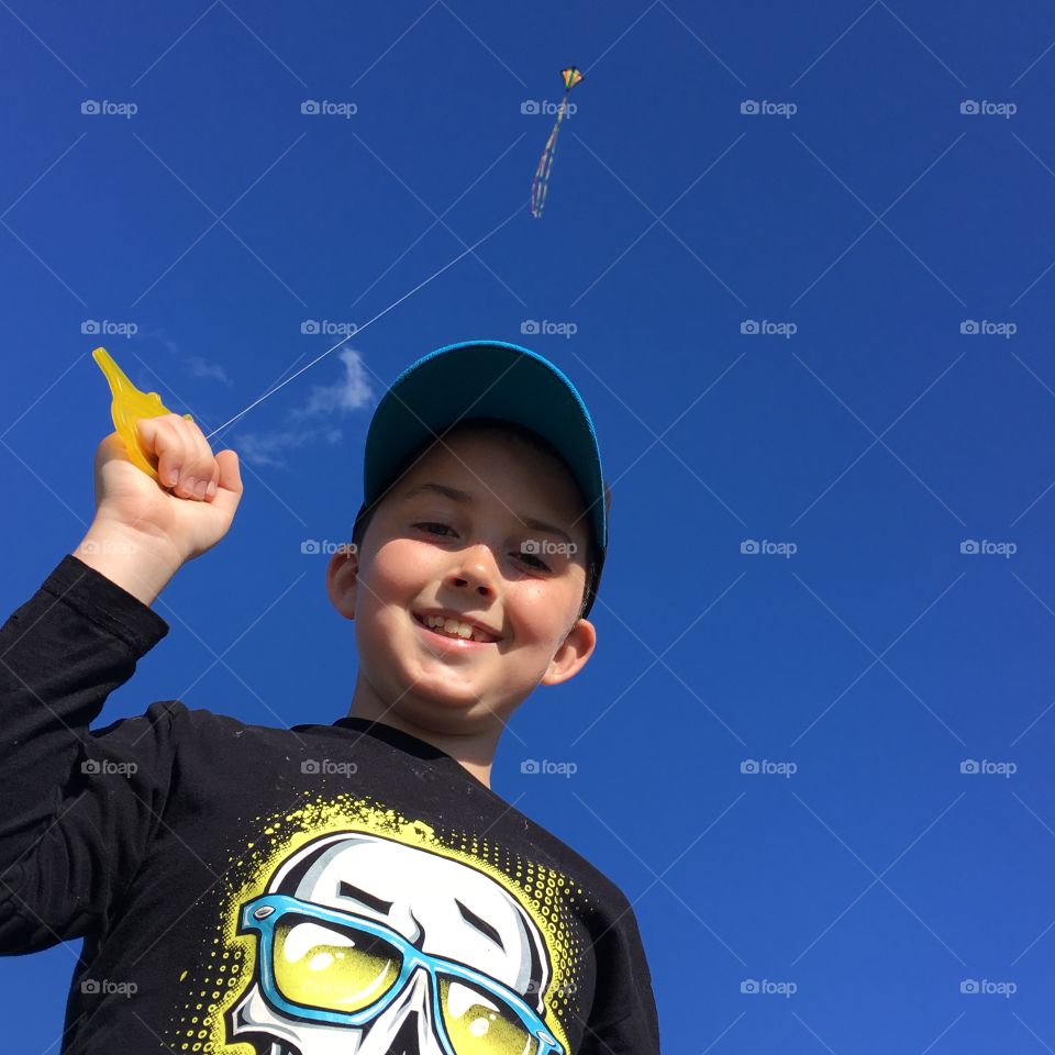Boy flying a kite 