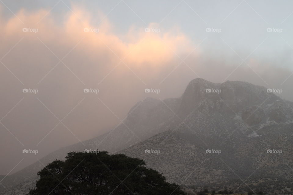 dawn pink cloud fog mountain top peak apex Huachuca range national park