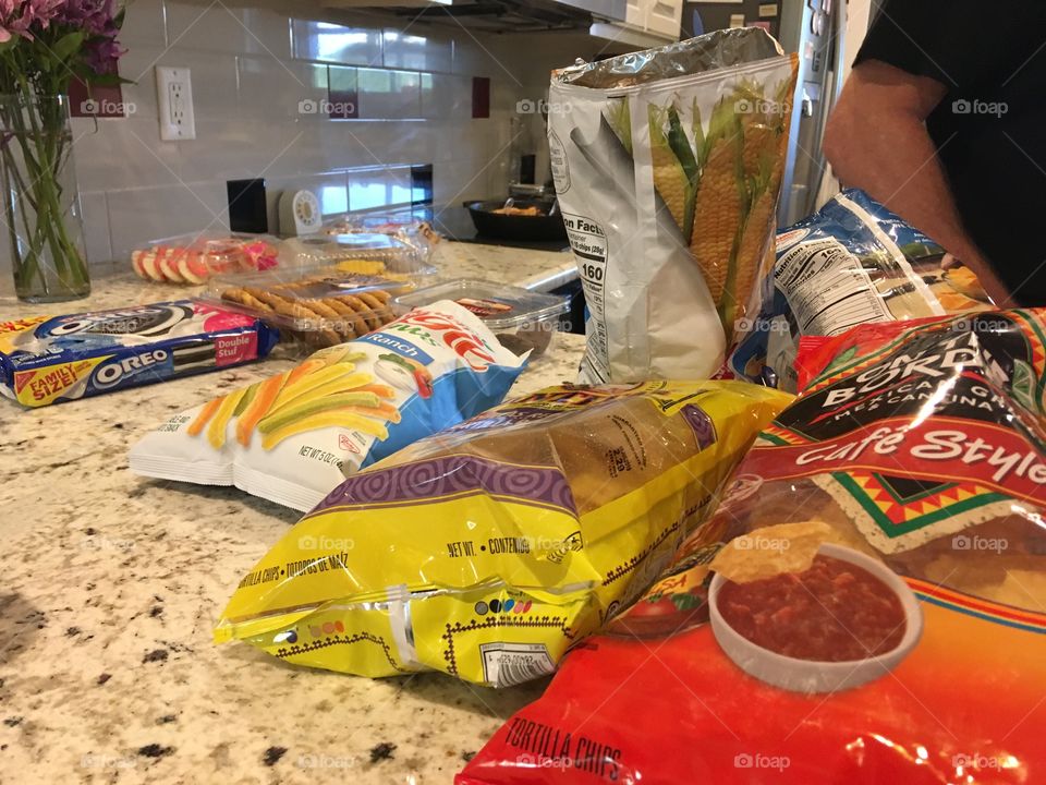 Snacks and more food to go with the hamburgers and hotdogs deserts too! Chow time!