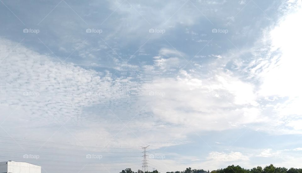 Two funny clouds fighting each others.