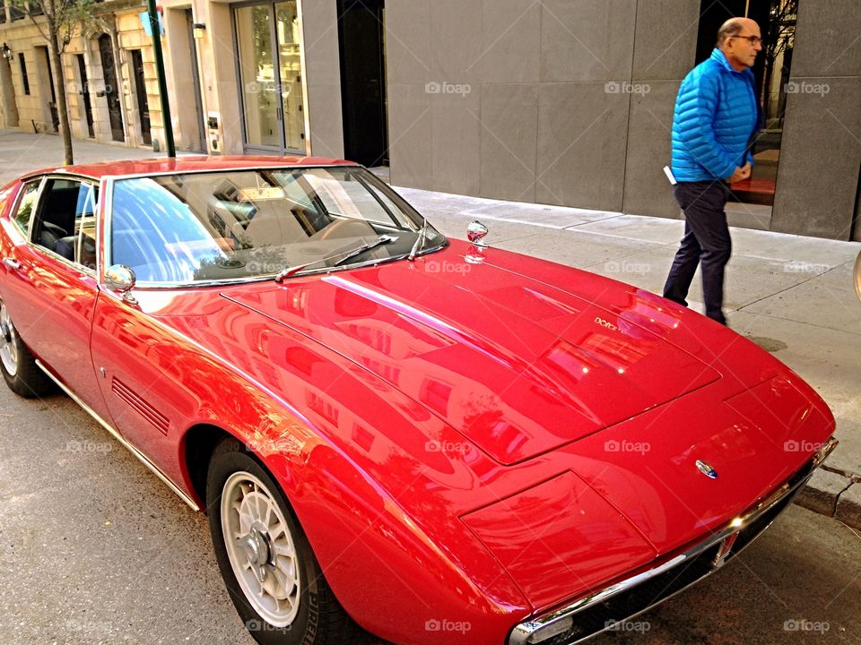 Red Car and Blue Jacket