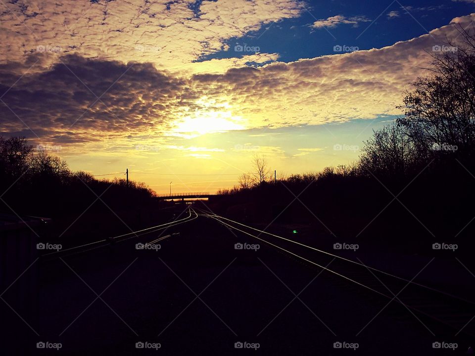 Sunrise over Train Tracks