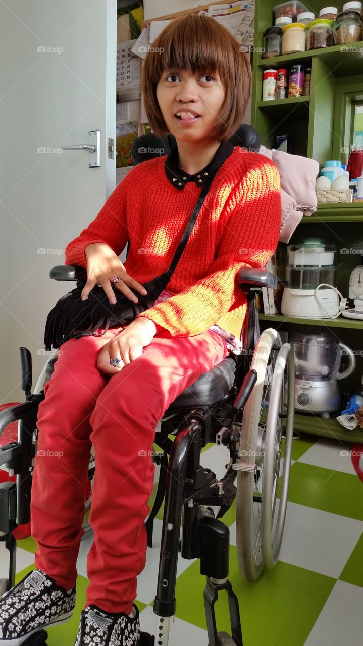 girl in orange. happy face