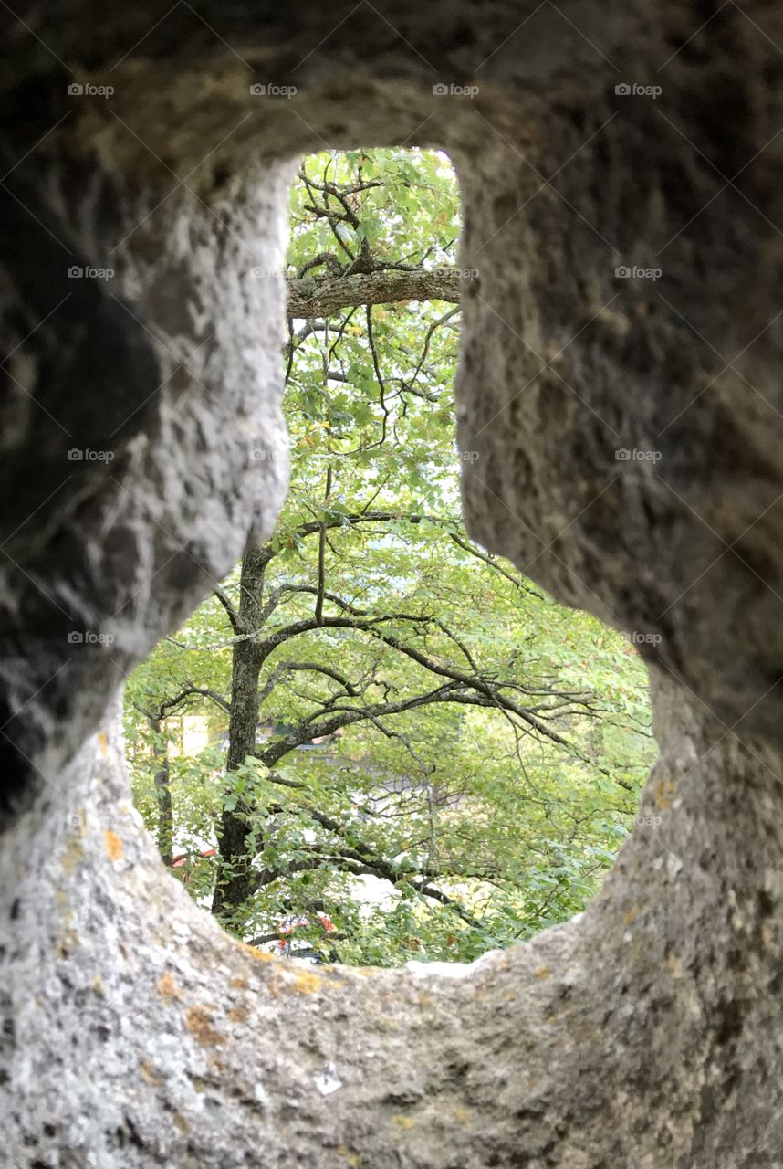 San Marino through castle gun hole