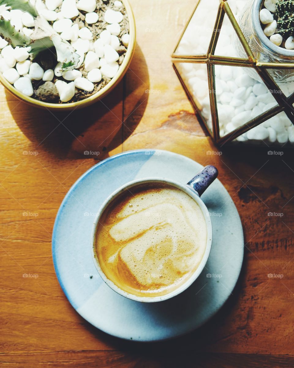 Coffee cup on table