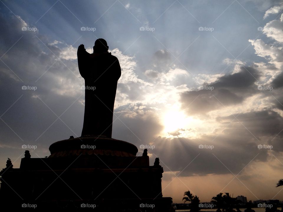 light and dark coexist - Buddha statue at Hyderabad
