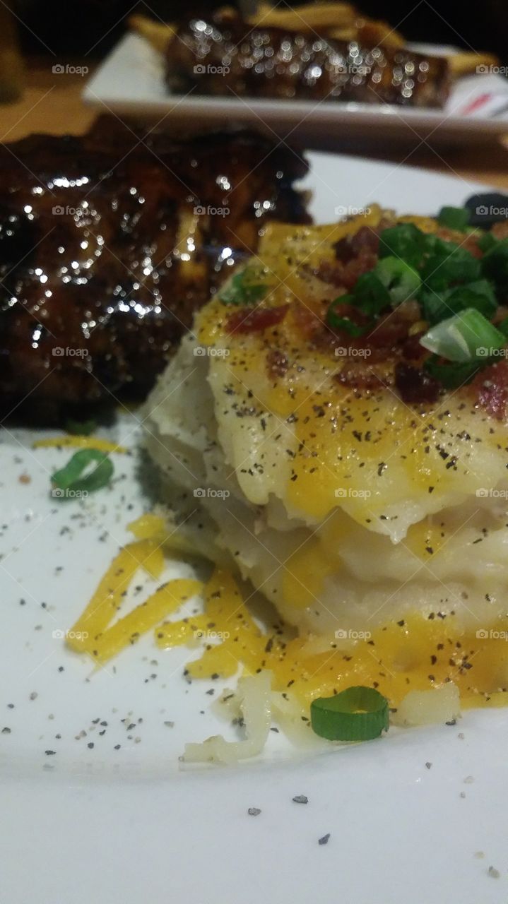 loaded mashed potatoes and black Pepper with baby back ribs