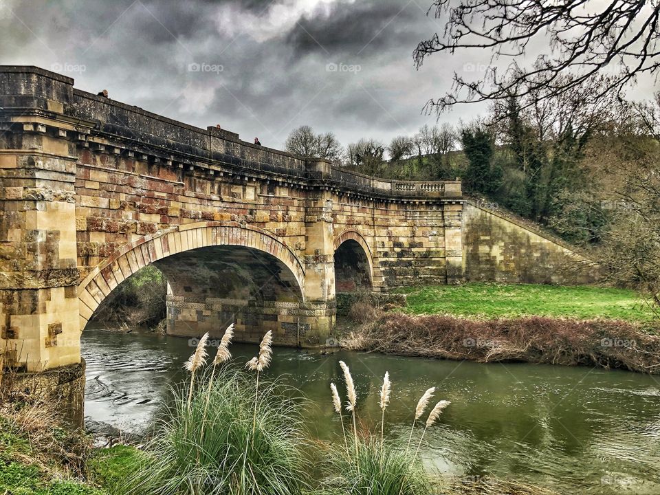 Old canal bridge over river Avon