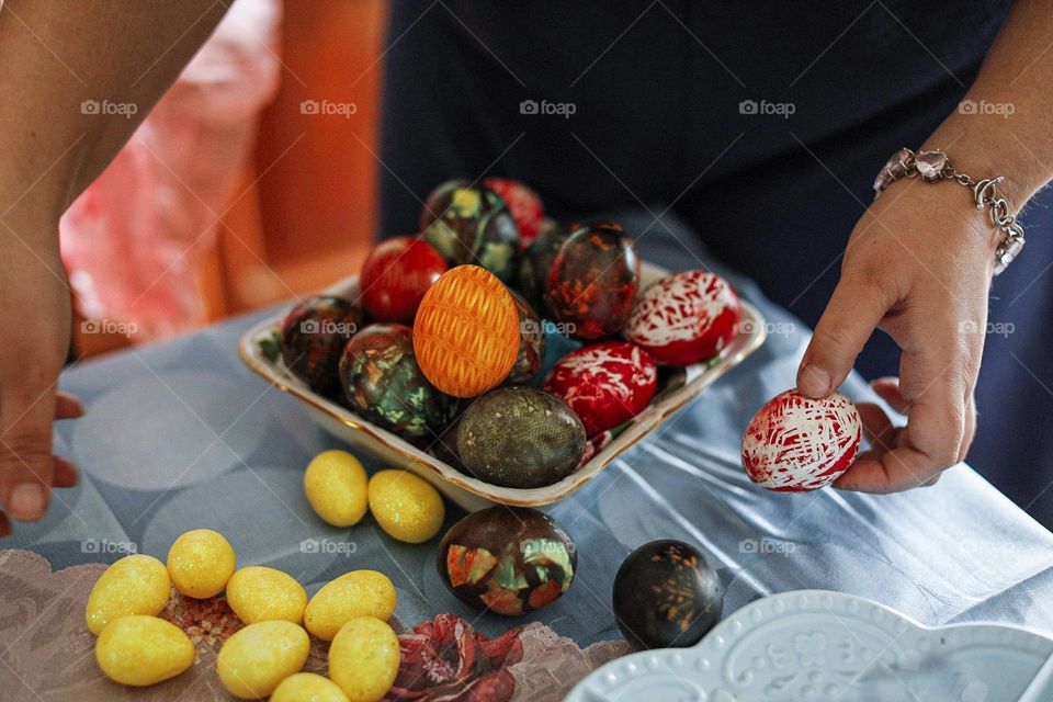 Stacking Easter eggs in a bowl