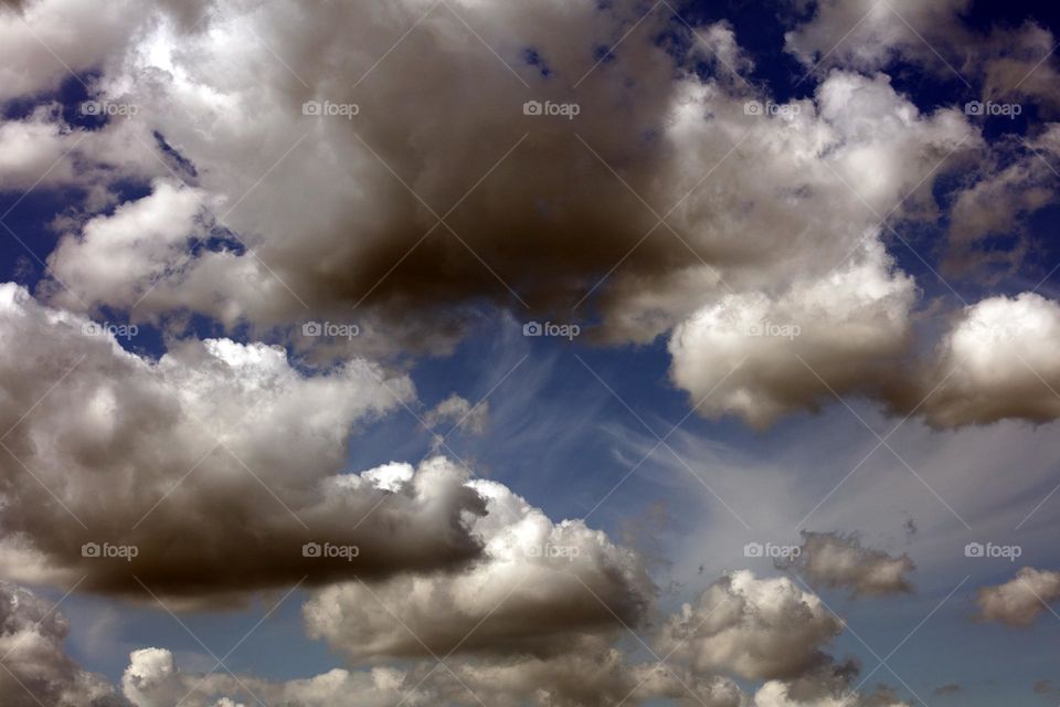 Black sky with clouds trippy psychedelic minimalistic background winter season daydreaming