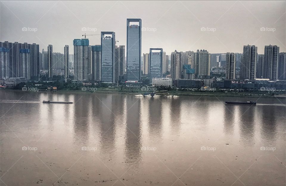 Greetings from Changsha in Hunan province - the reflection of urban development- highrises along the Xiangjiang river