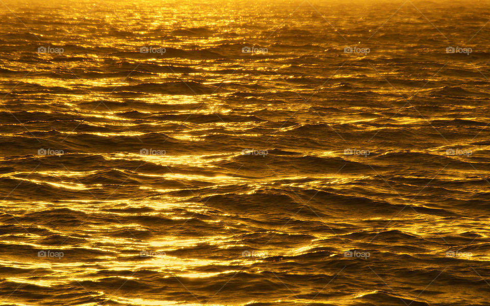 golden hug sun with water 