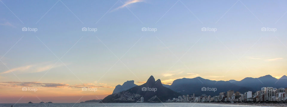 Rio de Janeiro - Ipanema Beach and Leblon Beach ending with Two Brothers hill and Vidigal community. Gorgeous sunset.