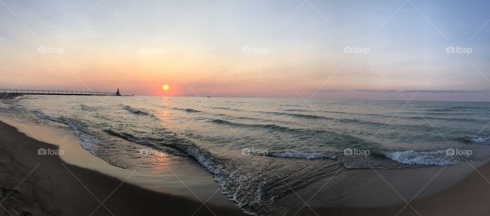 Lighthouse At Sunset