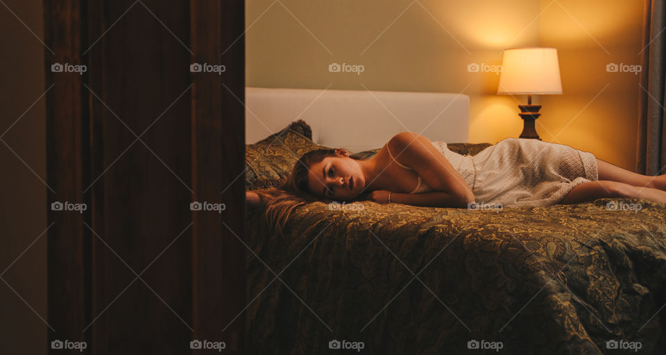 model posing on bed