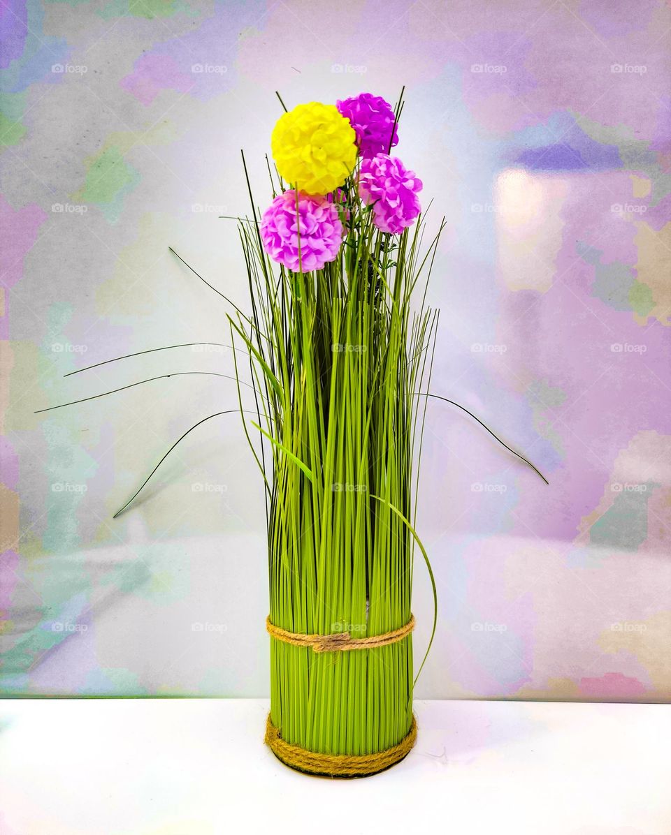 Colorful painted flowers in a vase