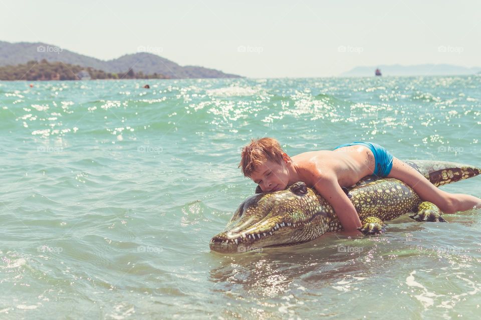 boy on crocodile