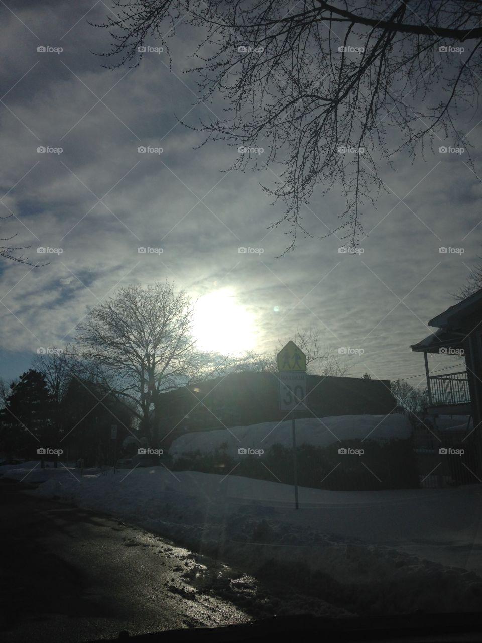 The sun in the sky in winter