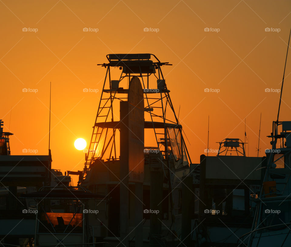 Silhouette of boat during sunset