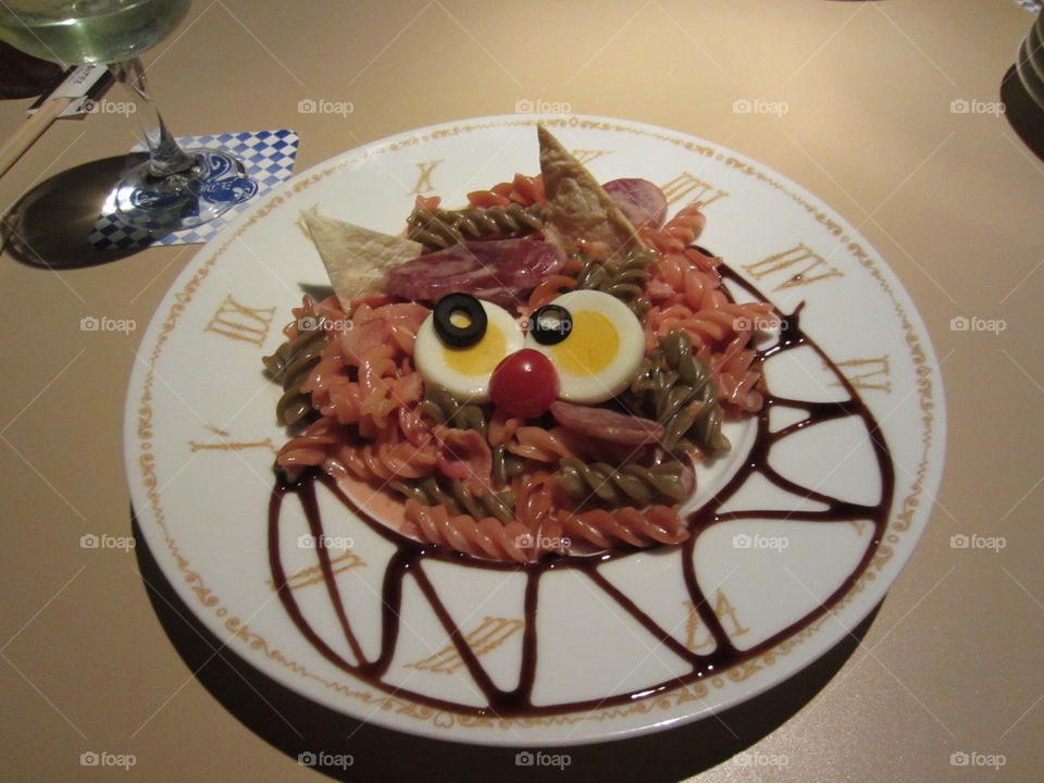 Alice in Wonderland Theme Restaurant in Tokyo, Japan. Cheshire Cat Pasta on a Clock Plate