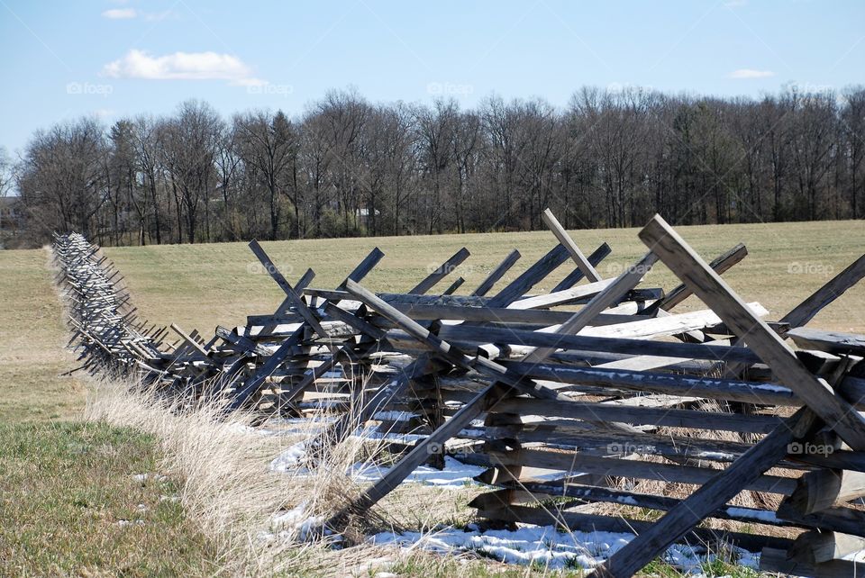 Frozen fence in winter