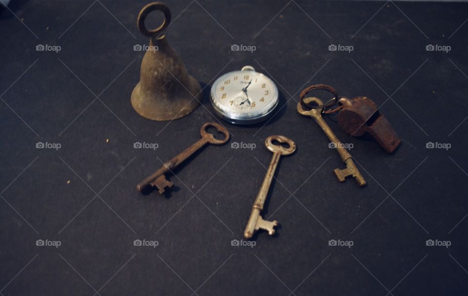 Antique things I have saved. Skeleton keys,bell,watch