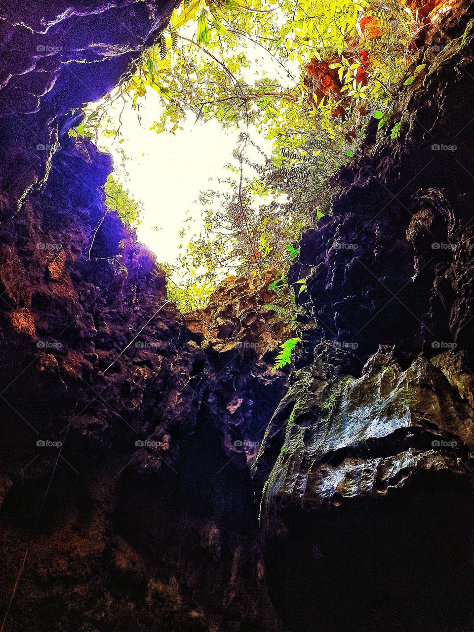 Darkness of life should be overcome, and see the happiness of life. Feelings come when you reach the end of a long, dark, underground cave. Picture taken from the narrow ends of a cave.