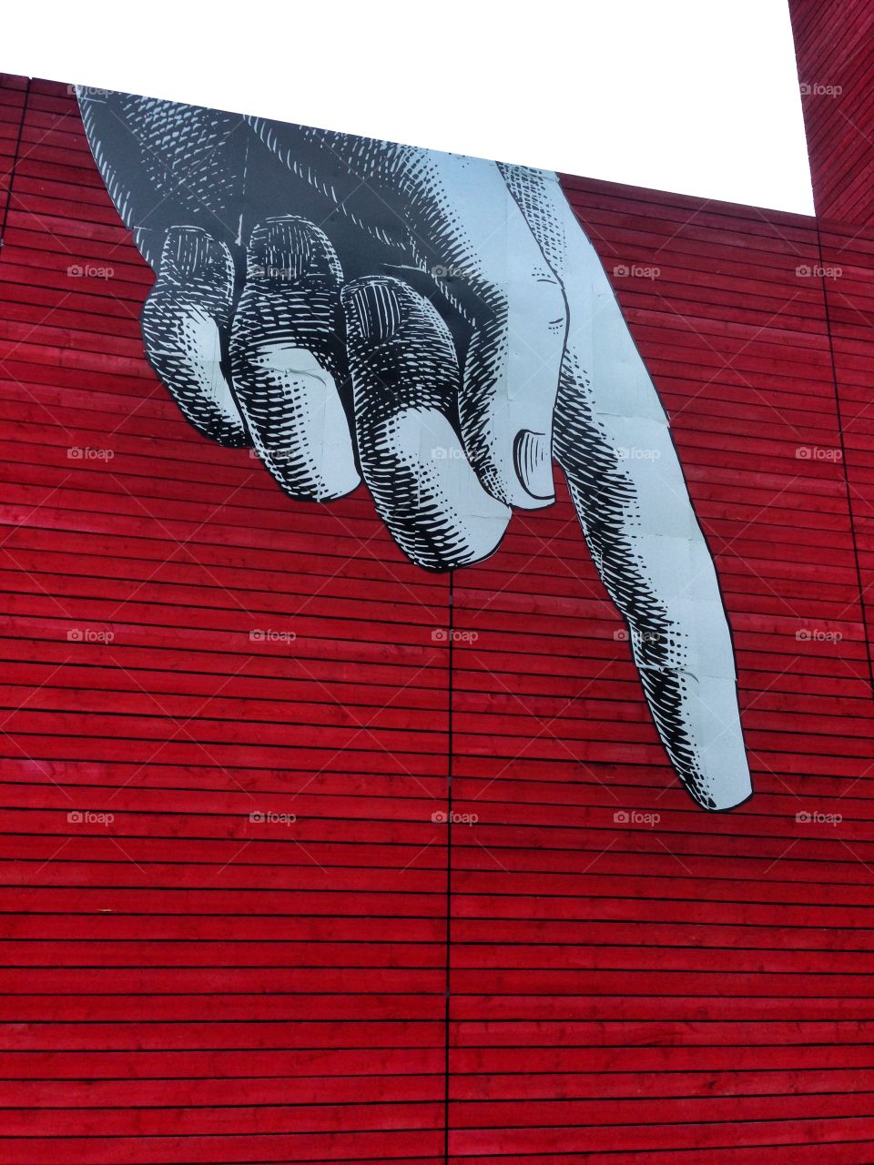 Pointing finger, hand . Pointing finger, hand on red background