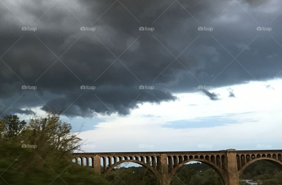 Storm clouds over bridge