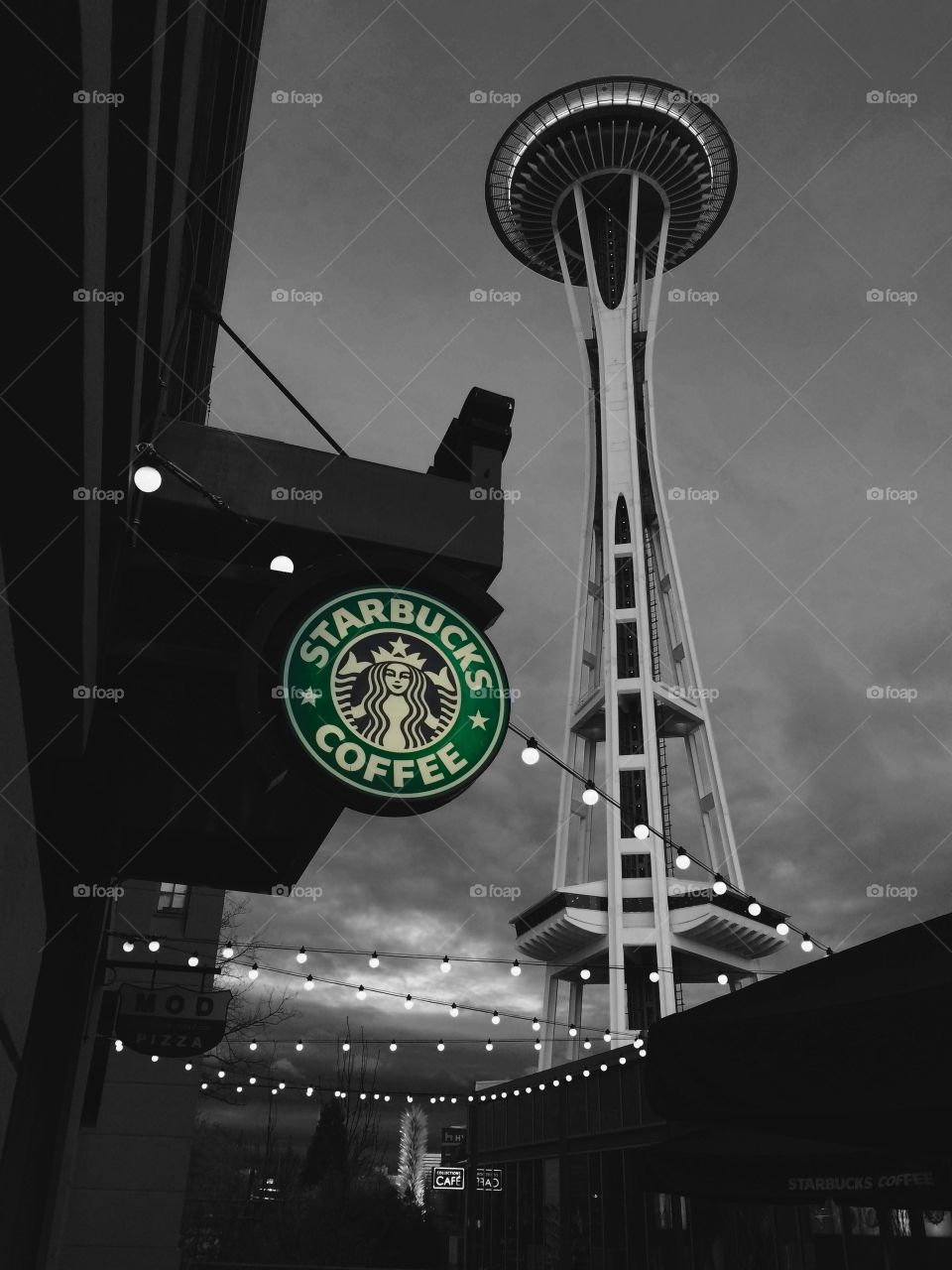 Wanderlust.. The one and only SpaceNeedle in Seattle, Washington. And the well known Starbucks logo with rows and rows of lights