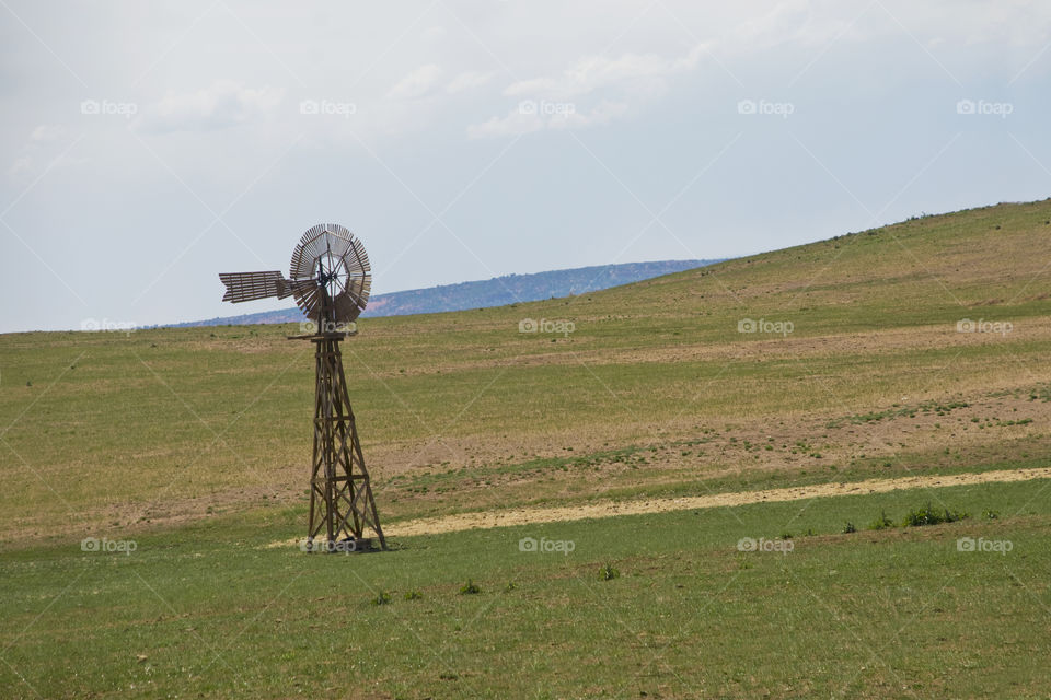 A windmill in the prairie