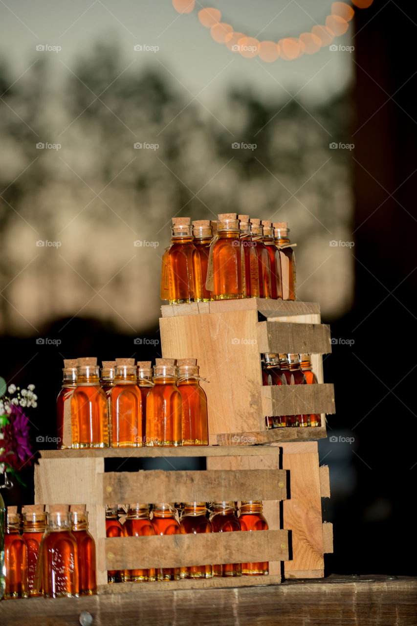 Stackes Crates of honey at sunset