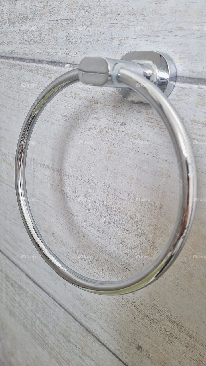 a circular hand towel ring