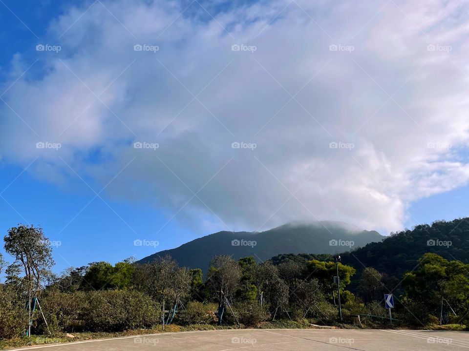 surrounded by clouds