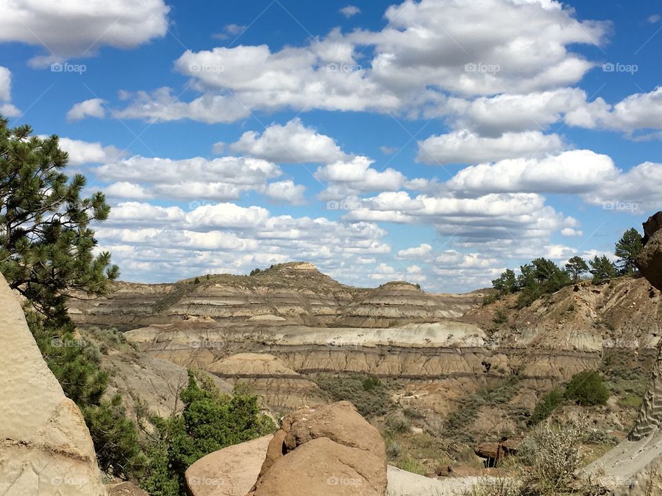 Clouds over badlands 