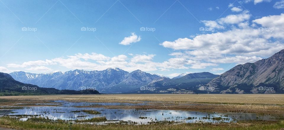 Sandy shores along mountain ranges