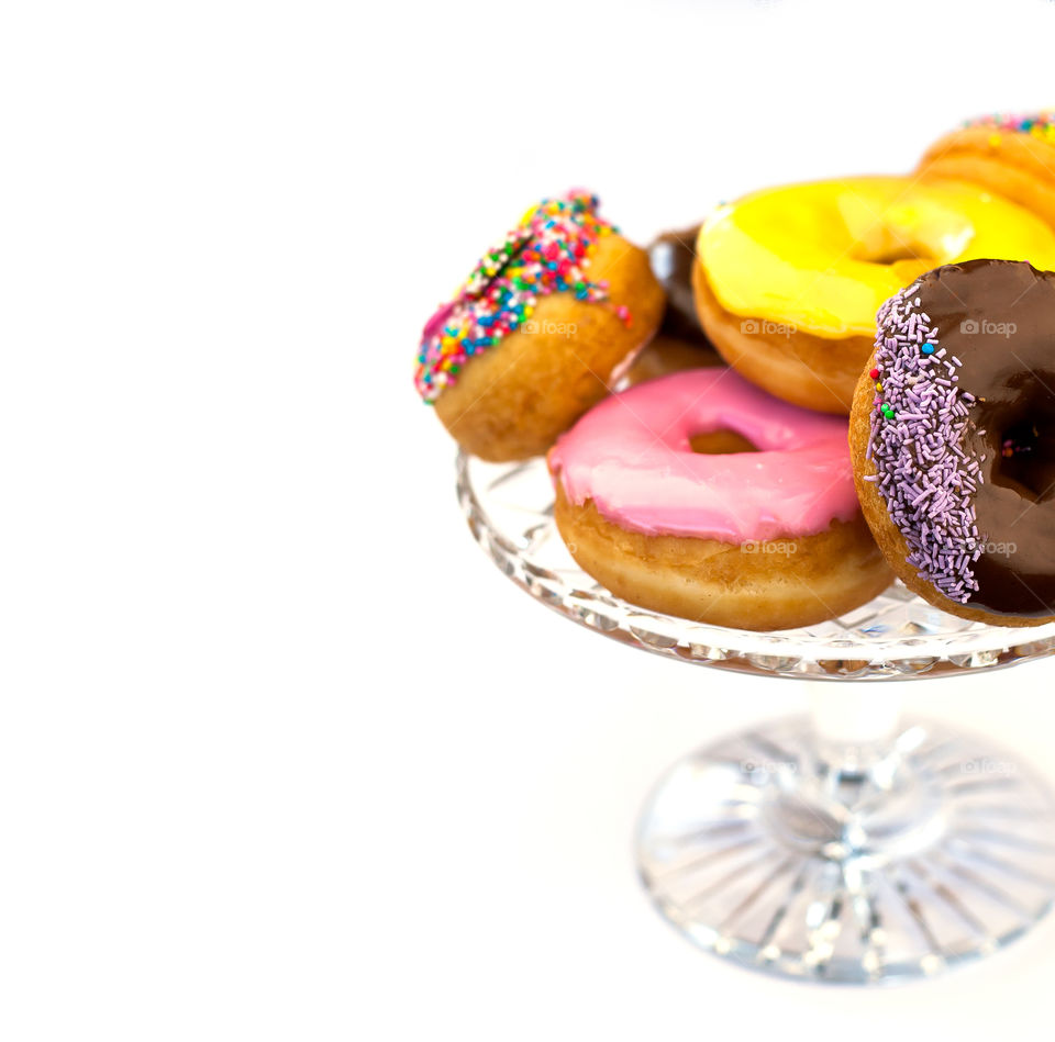donuts on the crystal dish on a white background