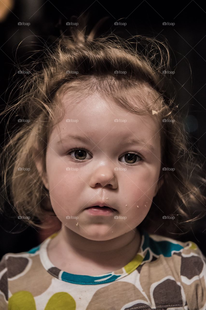 Adorable little girl looking at the camera