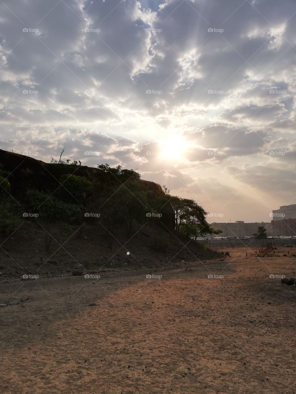 morning time sun popping through the clouds