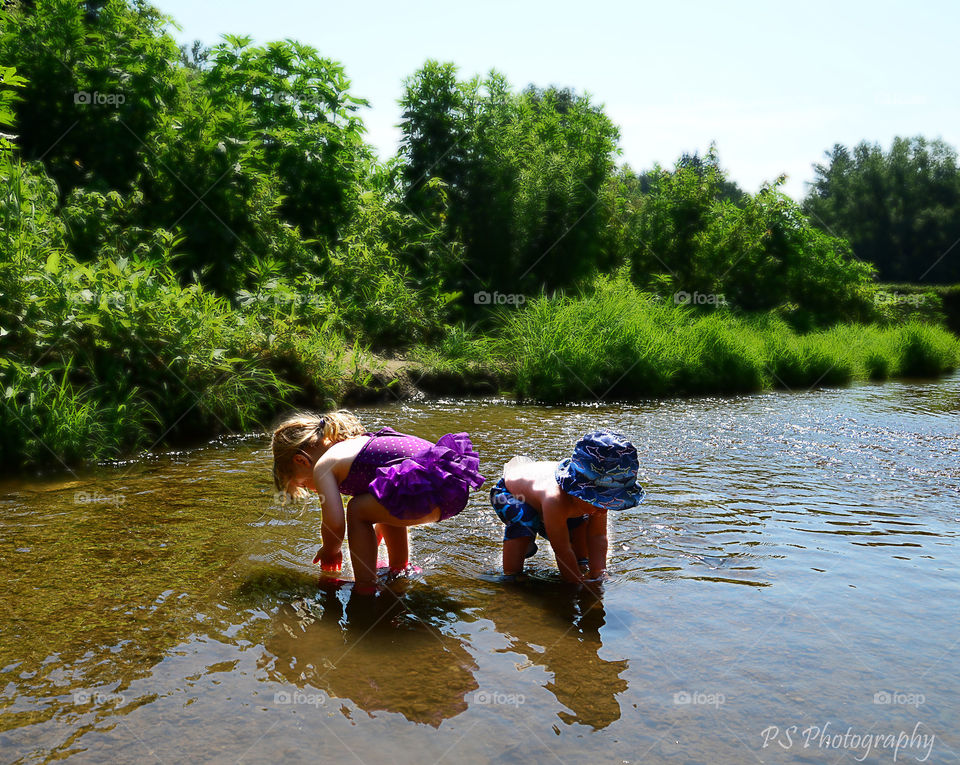 toddlers in stream