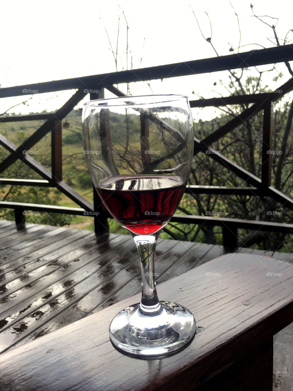 A glass of red wine on the patio